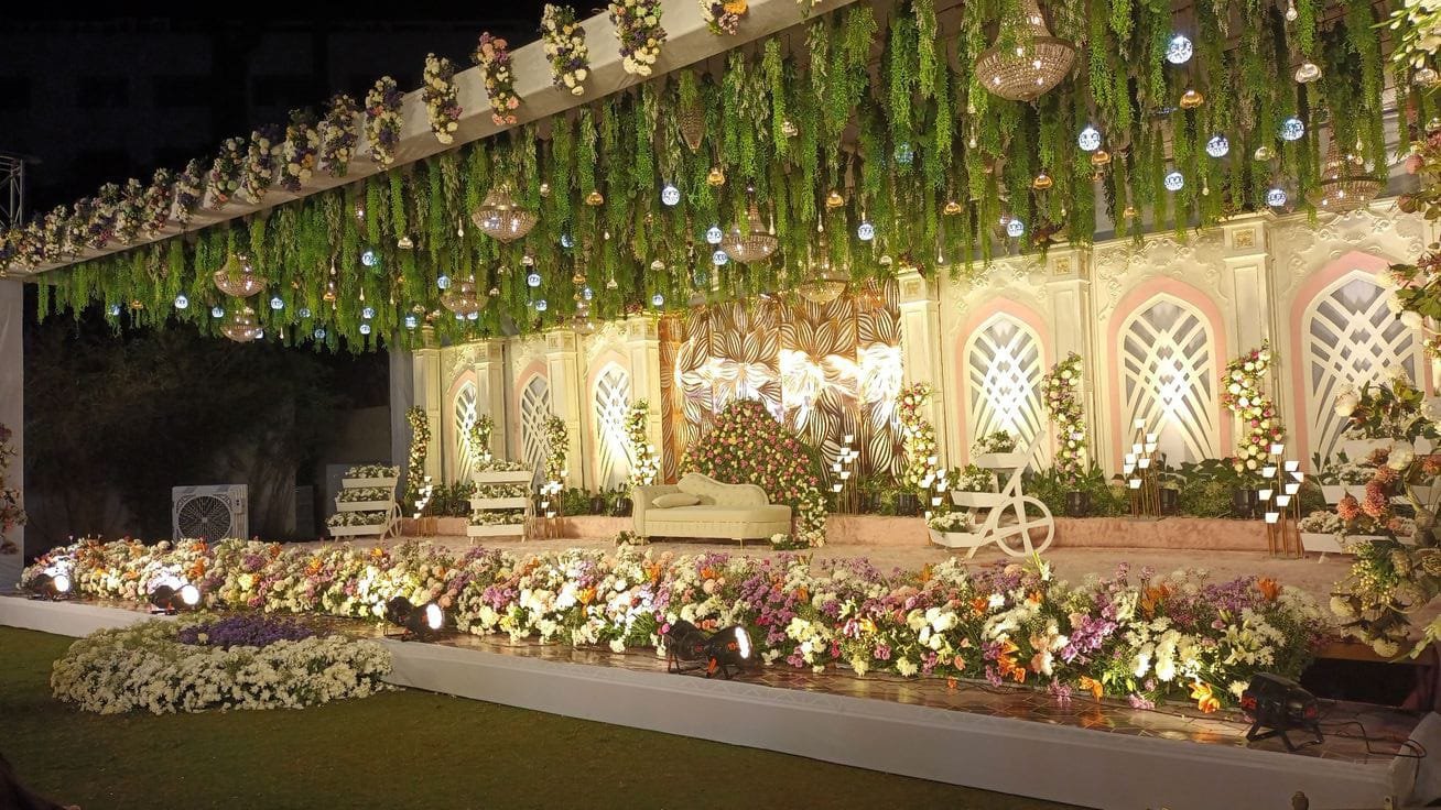 Floral stage decoration with hanging flowers